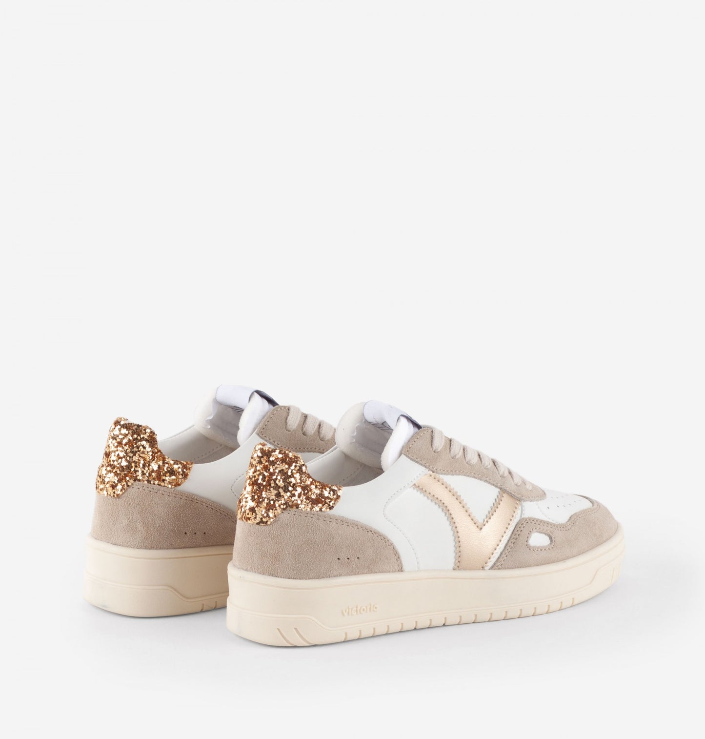 Goldene Seul-Turnschuhe