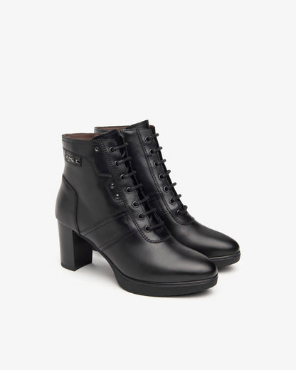 Schwarze Zitrusstiefel