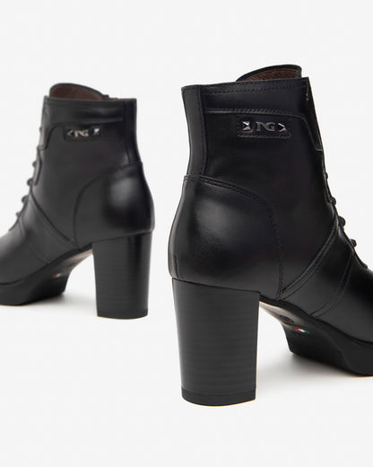 Schwarze Zitrusstiefel